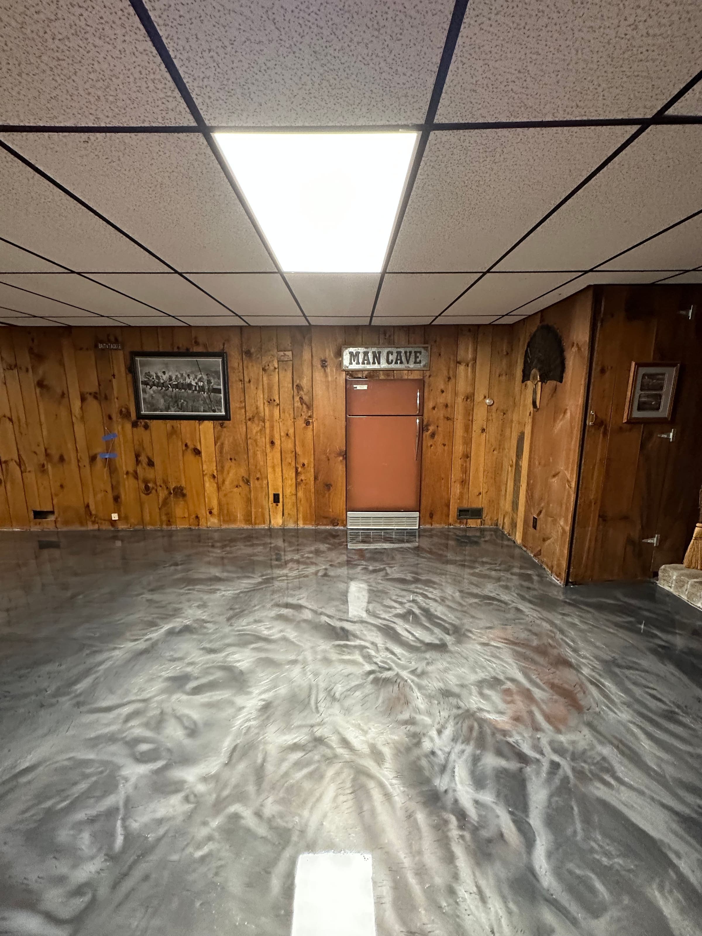 Basement with bronze metallic epoxy floor